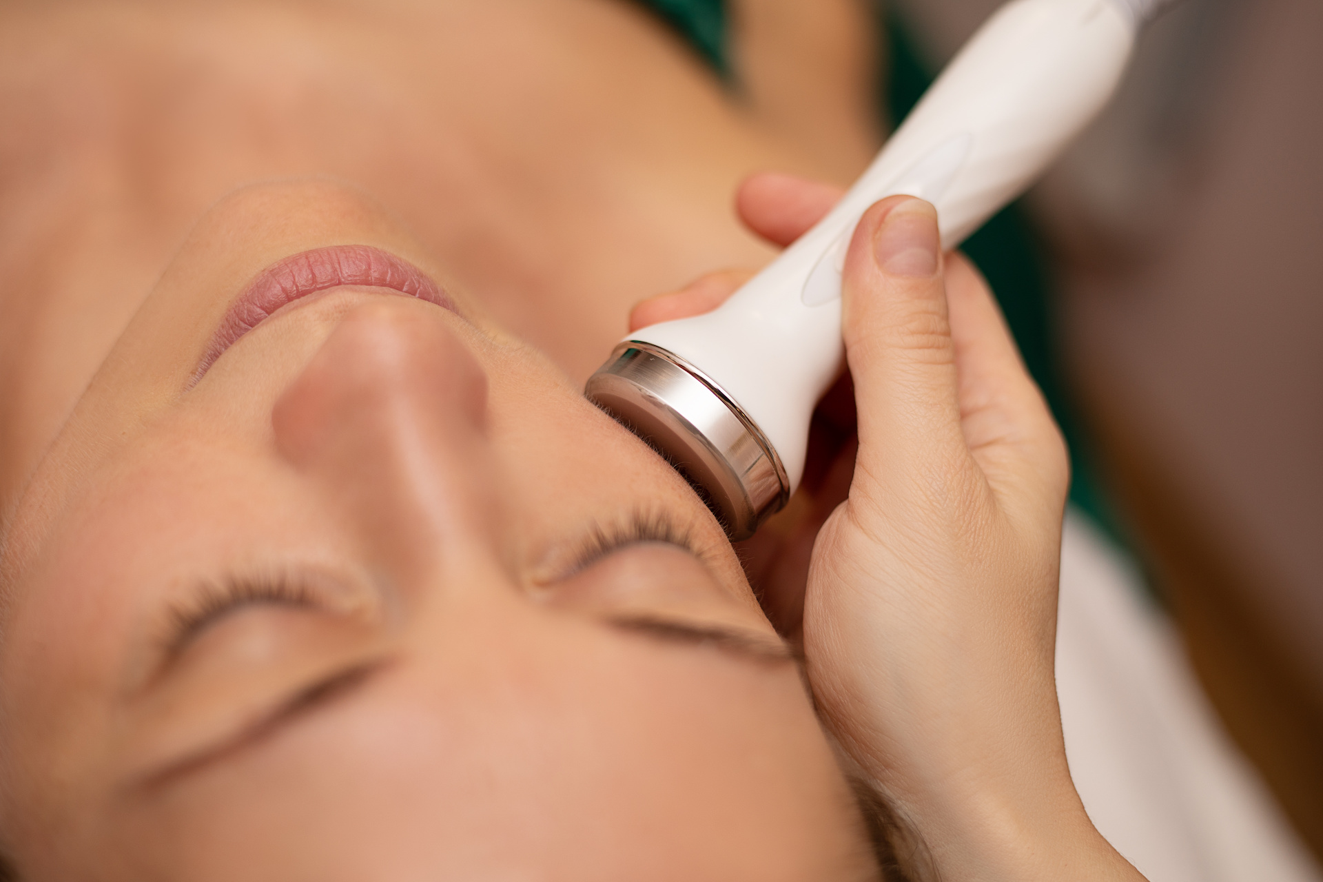 close up of woman getting hydrafacial